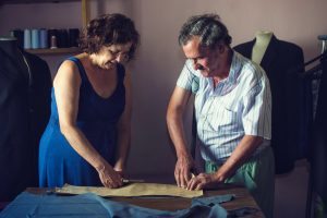 Mature couple working together on a tailoring