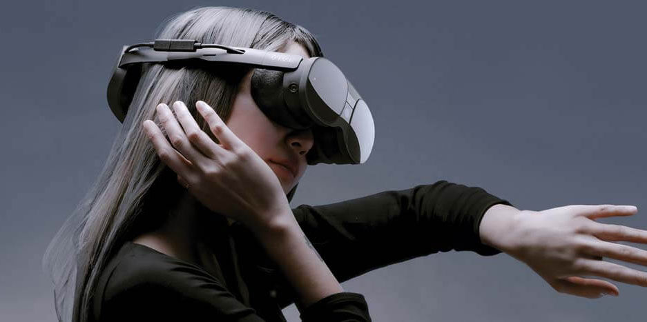 A woman using a virtual reality headset