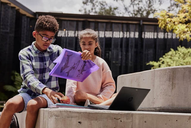 A boy and a girl studying