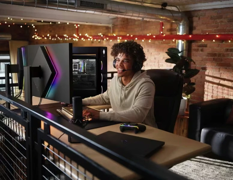 A man playing games on a desktop