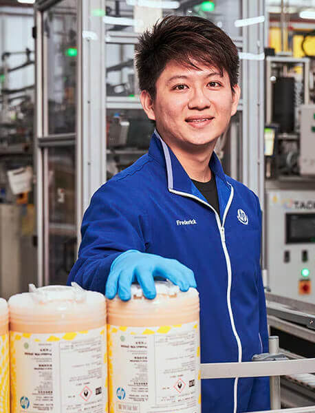 A man at work smiling