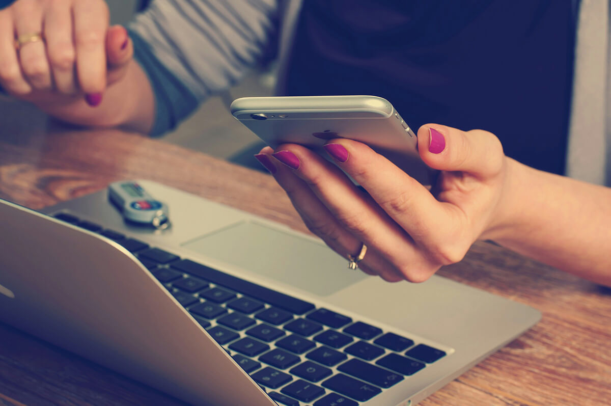 A person using their mobile phone