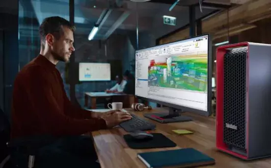 A man using a Lenovo ThinkStation
