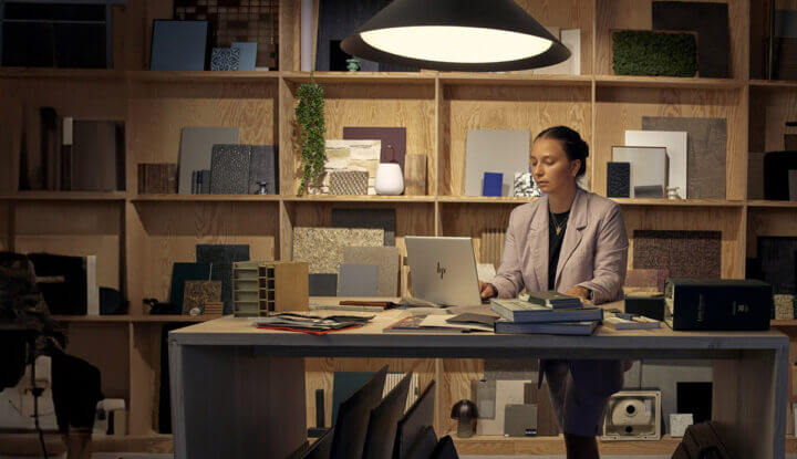 A woman using an HP laptop