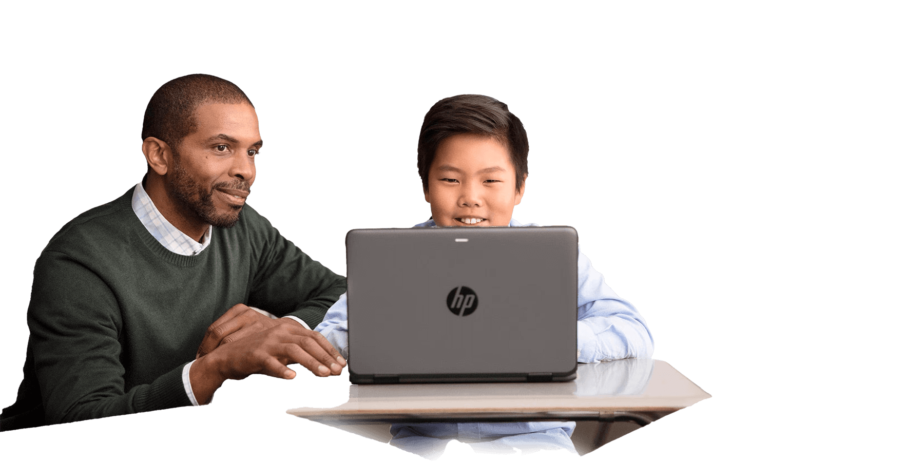 A teacher with a boy using a laptop